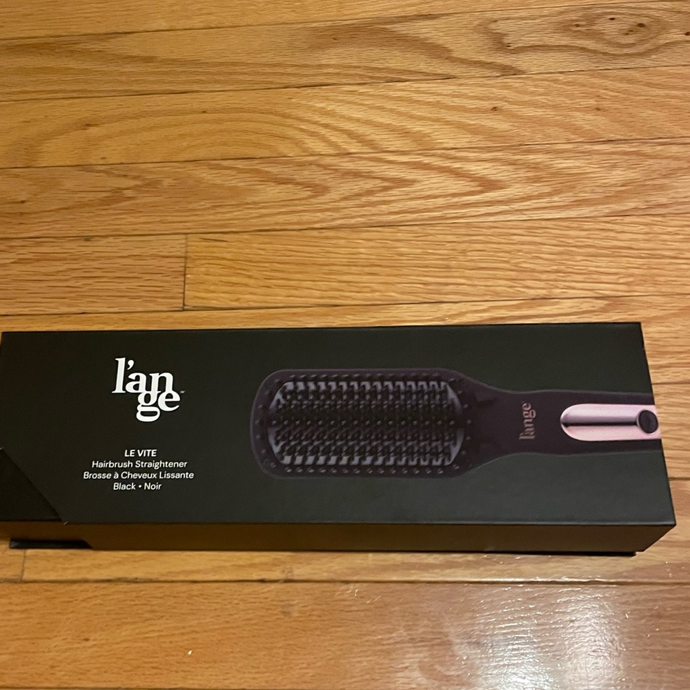New in box L’ange Hairbrush Straightener